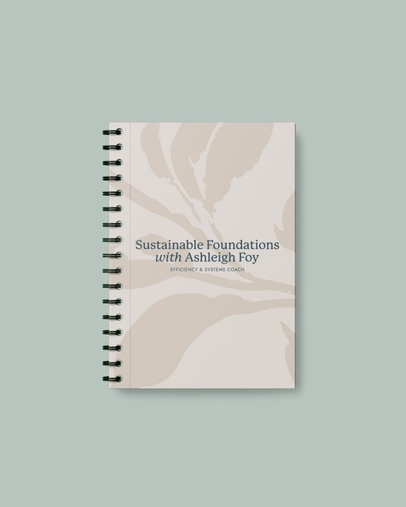 piral-bound notebook featuring the Sustainable Foundations logo, illustrating consistent, intentional branding for entrepreneurs.