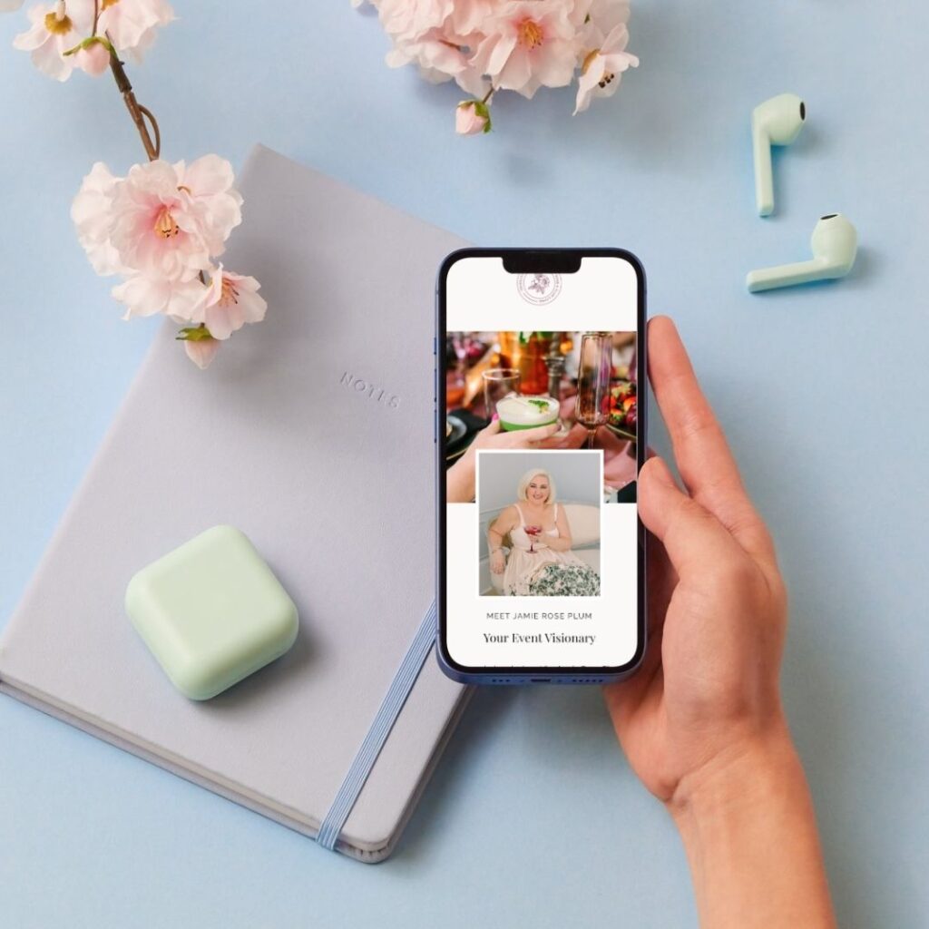 Woman holding her iphone with Plum & Rose website open